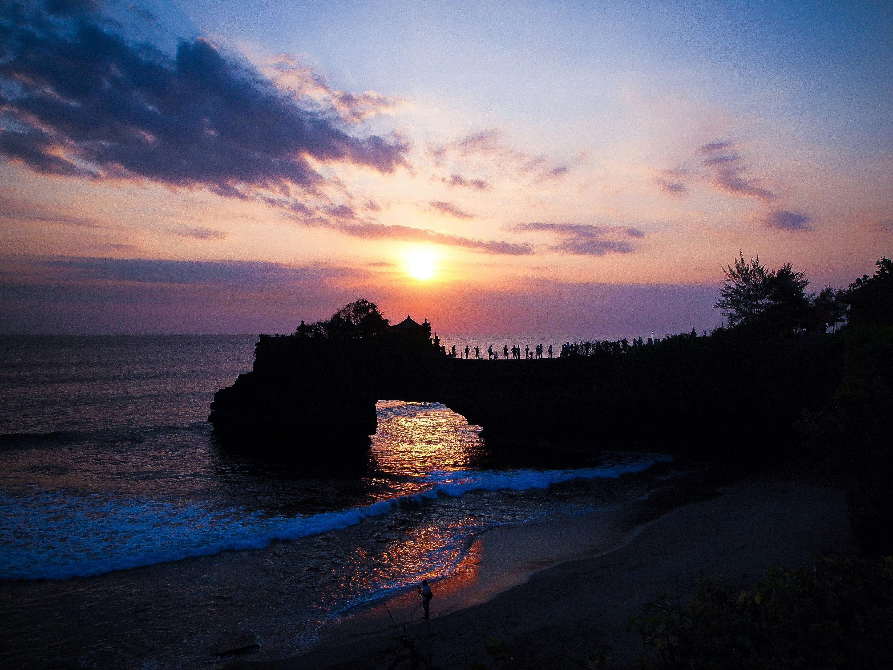 landscape photo of a beach at sunset